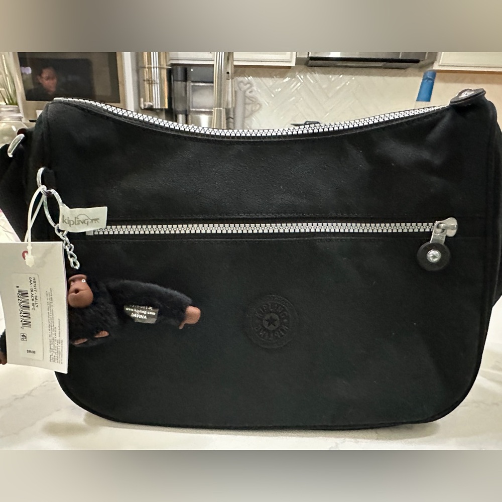 NWT Kipling Sally bag in color black.